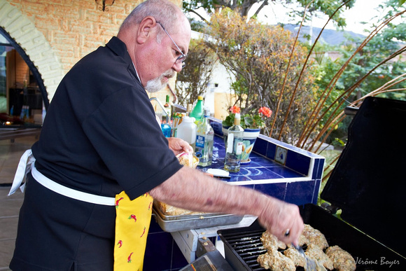 Norm is seriously busy grilling some delicious chicken.